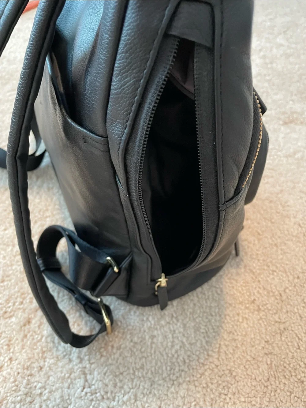 Tumi Black Leather Backpack with Goldtone Hardware